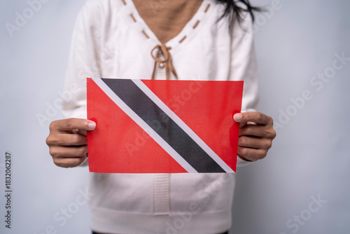 Person Holding the Trinidad and Tobago National Flag