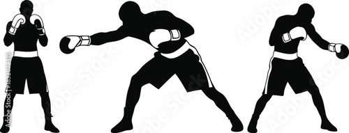 Boxer silhouettes in fighting stance training and practicing punches