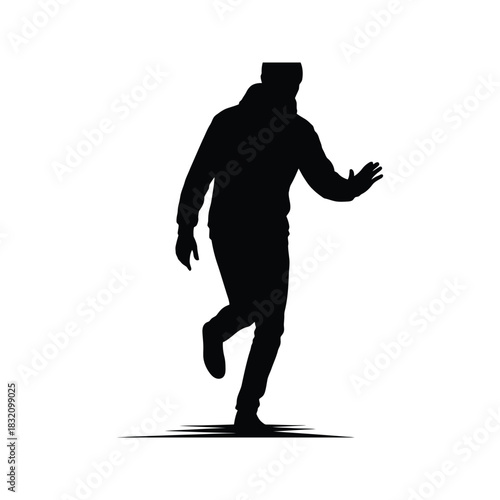 Silhouette of a man in a hoodie and gloves mid stride with one leg raised and arm outstretched