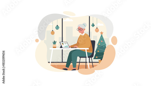 Senior woman uses a tablet for work in an office decorated for Christmas holidays