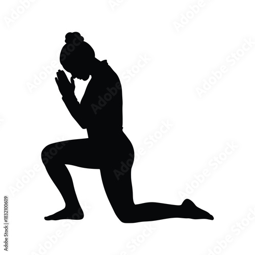 Silhouette of a woman kneeling with hands clasped in prayer or meditation against a white background