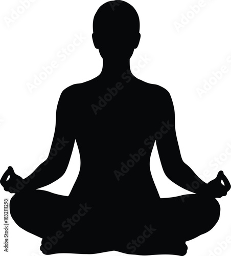Silhouette of person meditating in lotus pose