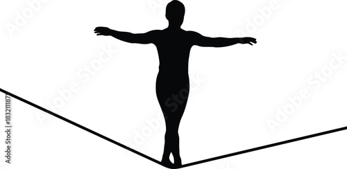 Silhouette of person balancing on tightrope