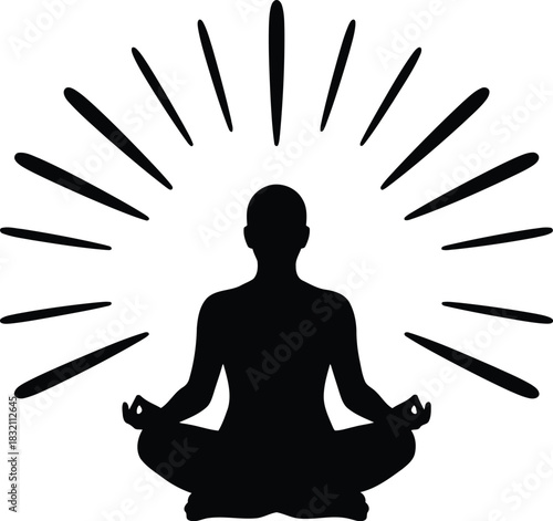 Silhouette of person meditating with radiant energy