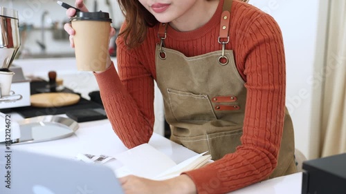 Young coffee shop owner feeling stressed while working on early business results, inexperienced entrepreneurs facing financial difficulty, lack learning, emotional pressure in small business startup
