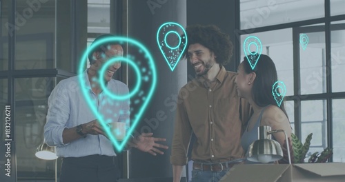 Standing three coworkers in business casual, laughing, holding coffee mug in office, cyan AR pins