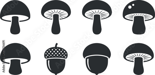 A set of black silhouette icons featuring mushrooms and acorns in minimalist vector style, ideal for nature-themed designs