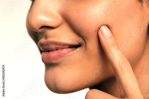 Woman Touching Smooth Facial Skin in Skincare Close-Up