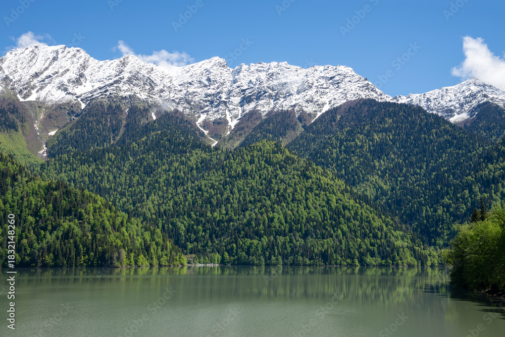 Fototapeta premium Lake Ritsa and snow-capped mountain peaks, Abkhazia