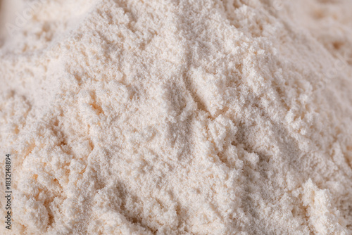 Photos Close-up of zinc oxide (ZnO) powder with a fine, white, and chalky texture