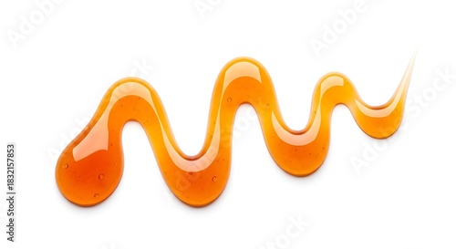 Golden honey drizzle swirl on a white background