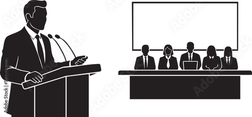 Silhouette of speaker at podium addressing panel in meeting
