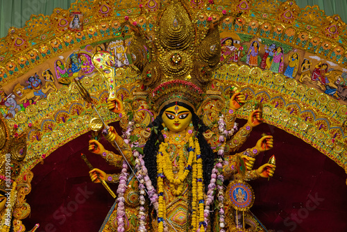 Tableau sur toile A beautifully crafted handmade colorful goddess durga idol decorated for Navratri, featuring vibrant traditional attire, intricate jewellery, and divine expressions at colorful pandal
