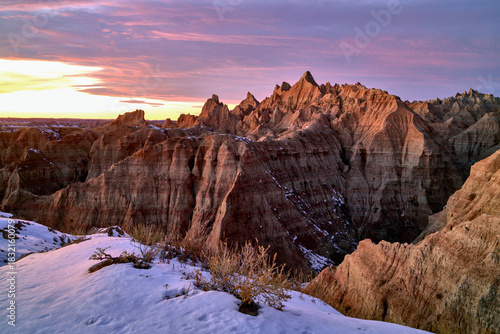 Obraz na plátně Alpenglow on Snow-Dusted Badlands Spires