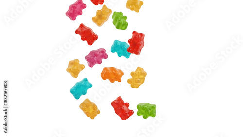Colorful gummy bears falling against black background