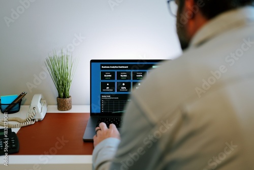 Business professional analyzing colorful sales funnel, ROI, inventory dashboards on laptop - Perfect for SaaS, analytics, fintech, data themes