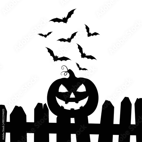 Black silhouette of a smiling jack o lantern above a picket fence with bats flying