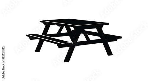 A stark image of an empty black picnic table against a white backdrop silhouette