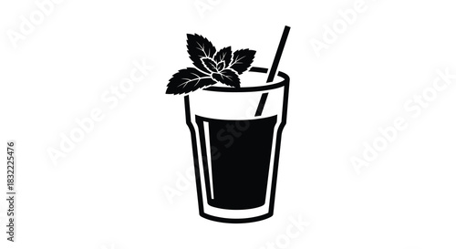 Refreshing summer drink with a mint garnish and a straw a stylish silhouette