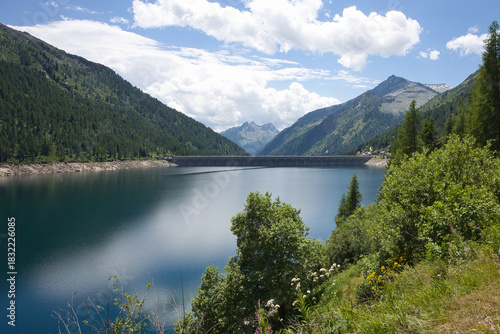 At the end of the Italian Malga Bissina Lake is a dam.