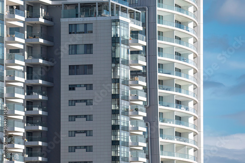Modern apartment buildings in Limassol with glass balconies are enjoying a beautiful sunny day. Cyprus