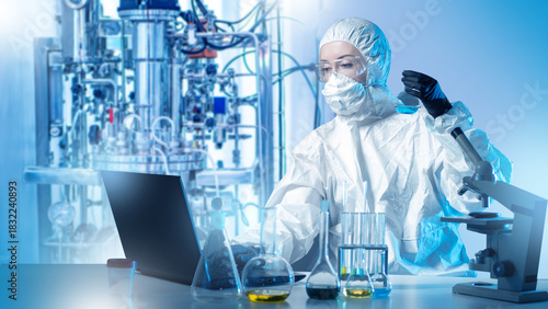 Картината върху платно Biochemical research specialist analyzes samples in a sterile lab, operating equipment and recording experimental data to support industrial biotechnology processes