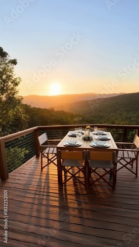 Luxurious Glamping Tent Interior with Panoramic Sunset Views from an Outdoor Deck
