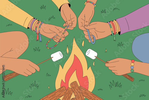 Group of Friends Around Campfire Roasting Marshmallows and Making Friendship Bracelets at Camp