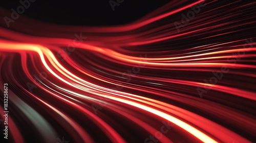 Abstract red light trails flowing across a dark background creating a dynamic and vibrant effect