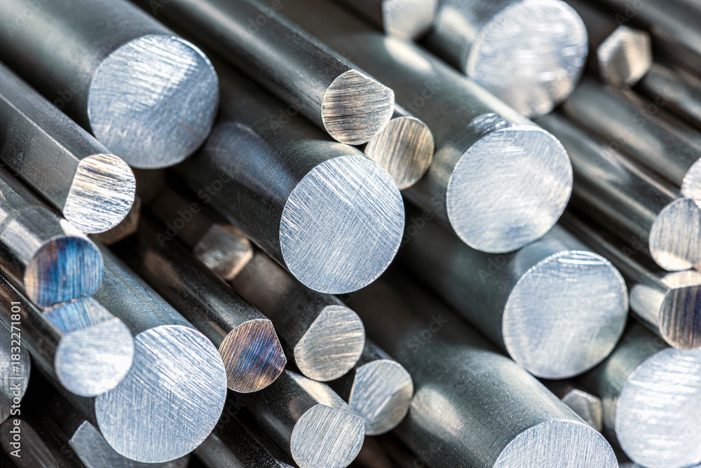 Φωτογραφία A stack of steel rods with a cross section texture, products of the metallurgica