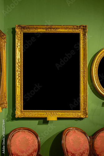 Wallpaper Mural Ornate golden frame on a green wall. Vintage luxury style mockup with black copy space for portraits or art. Torontodigital.ca