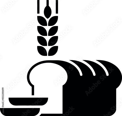 Wholesome sliced bread and wheat stalk, symbolizing natural ingredients and baking.