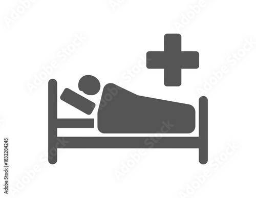 Person lying in a hospital bed with a medical cross symbol above it all