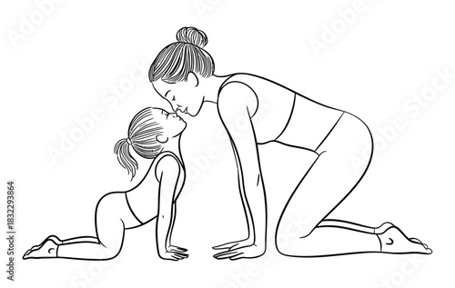 A mother and daughter share a tender moment while practicing yoga together.