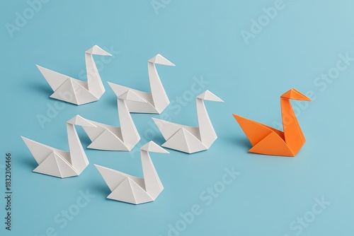 Fototapeta Naklejka Na Ścianę i Meble -  Paper origami swans symbolizing teamwork creativity and new business ideas 3D rendering