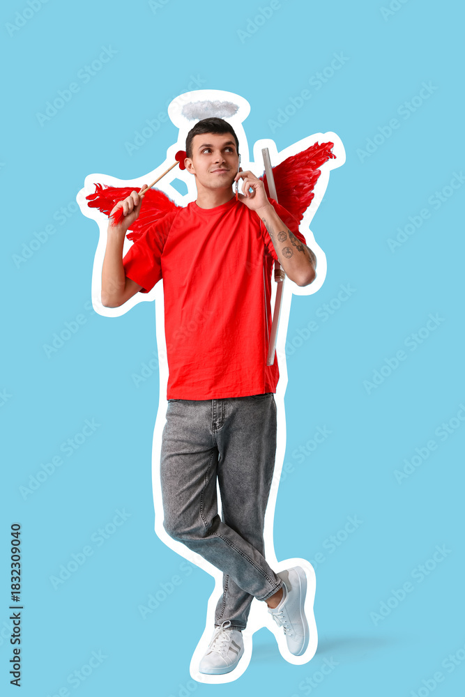 Obraz premium Young man dressed as Cupid with arrow talking by mobile phone on blue background. Valentine's Day celebration