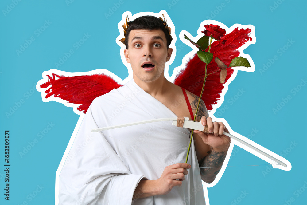 Obraz premium Shocked young man dressed as Cupid with rose and bow on blue background. Valentine's Day celebration
