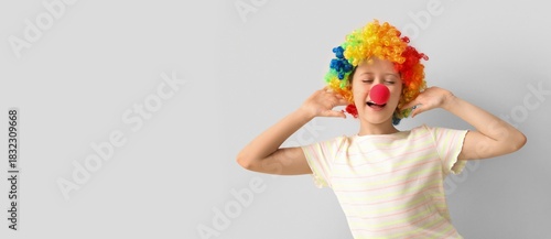 Funny girl in clown costume...