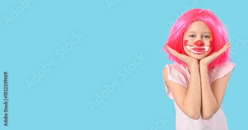 Funny girl in clown costume...