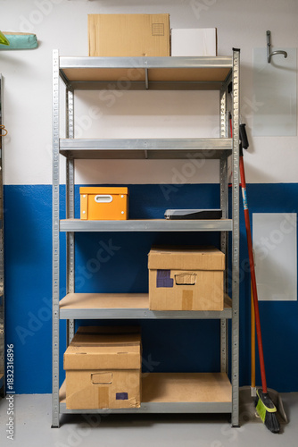 Metal shelves with storage boxes organizing garage space