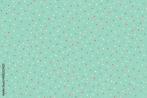 Seamless red and white polka dot pattern on mint green background