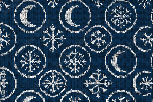Knitted winter pattern with moons and snowflakes