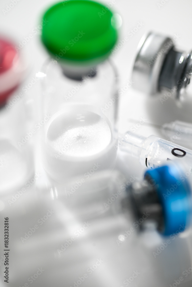 © Anna Hoychuk - Close up of Glass Vials with Lyophilized Peptides © Anna Hoychuk - Close up of Glass Vials with Lyophilized Peptides