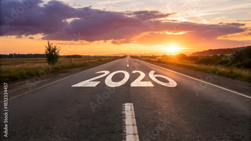 New year 2026 or straight forward concept. Text 2026 written on the road in the middle of asphalt road with at sunset. Concept of planning, goal, challenge, new year resolution.