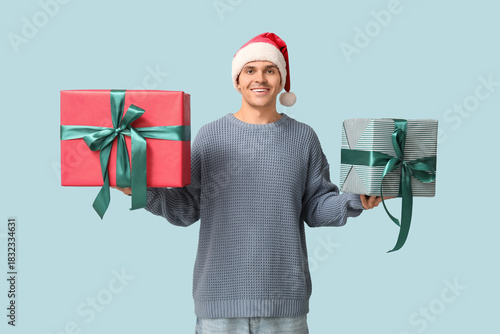 Handsome young man in Santa...