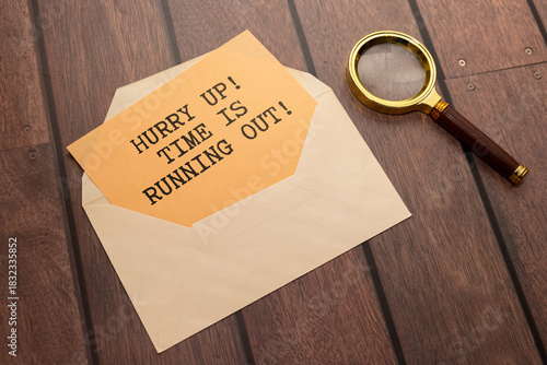 Time is running, text on notepad with clock on white background