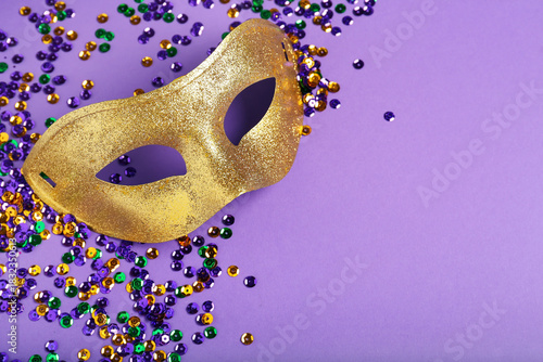 Shiny carnival mask with de...