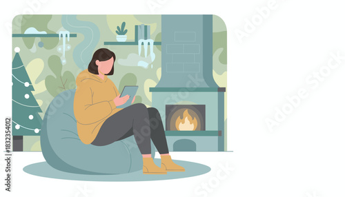 Woman relaxing indoors by fireplace with tablet on a cozy winter evening