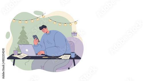 Man using laptop and phone while working remotely during the winter holiday season Cozy work setting