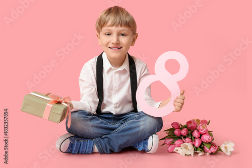 Cute little boy with figure...